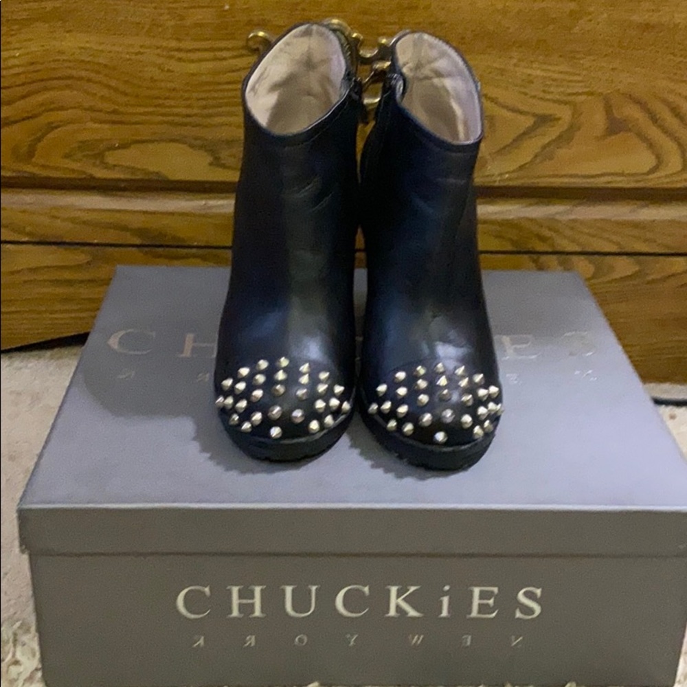 Wedge bootie in studs , in excellent condition .